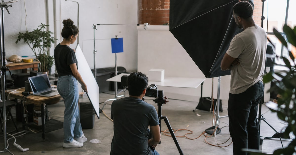 Flapen cover for Top ranked Amazon agencies vs DIY software stacks: a seller watching their first product being photographed by the Flapen team