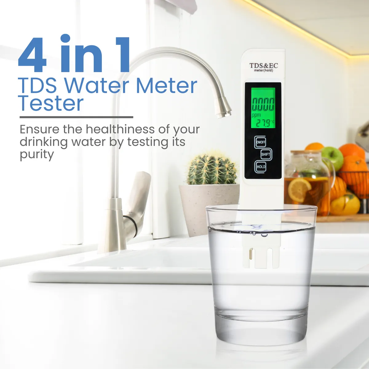 TDS and EC pen meter standing in a glass of water beneath a kitchen tap