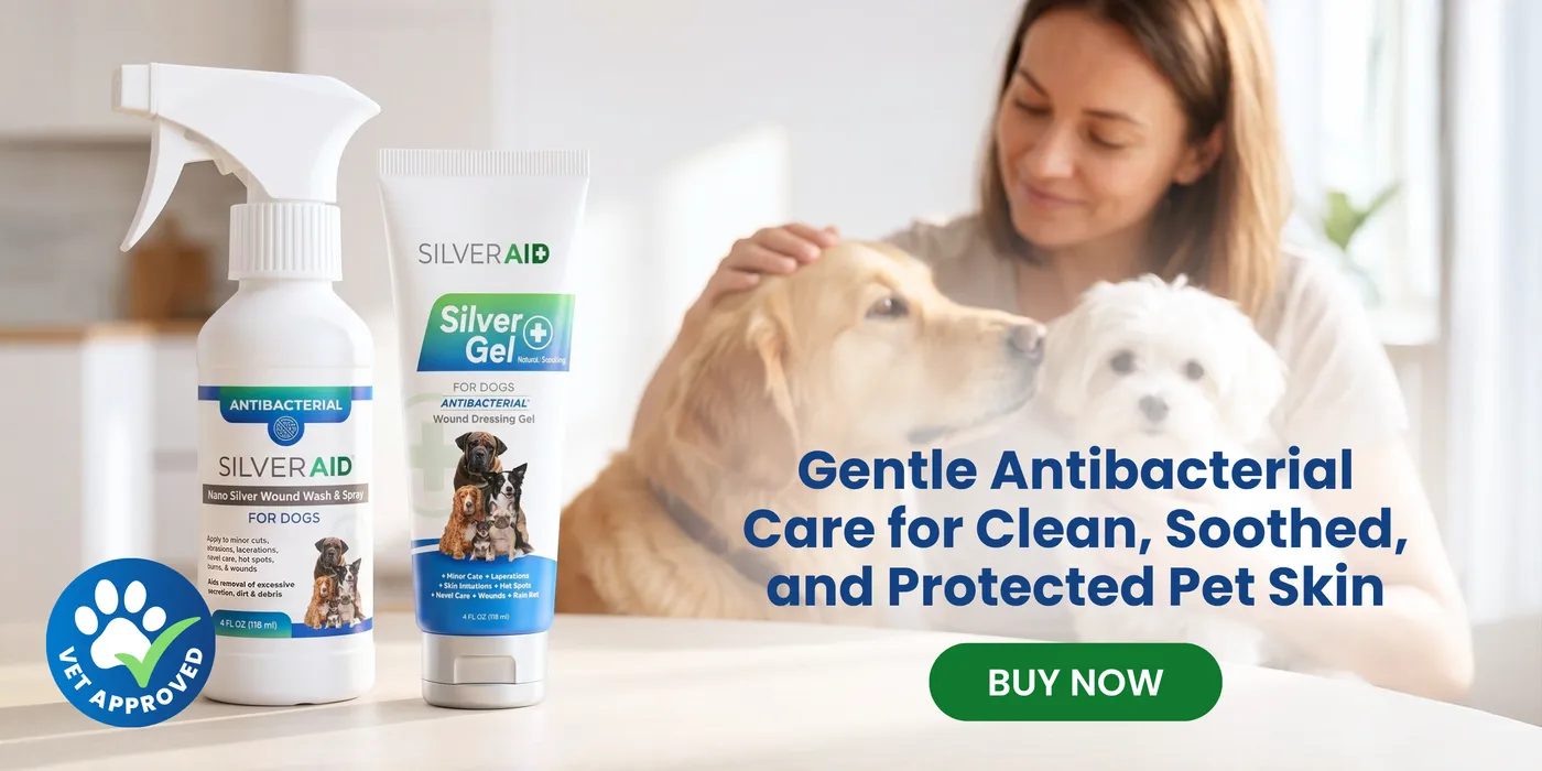 Woman petting a golden retriever while holding a small white dog, next to a SilverAid spray bottle and Silver Gel tube