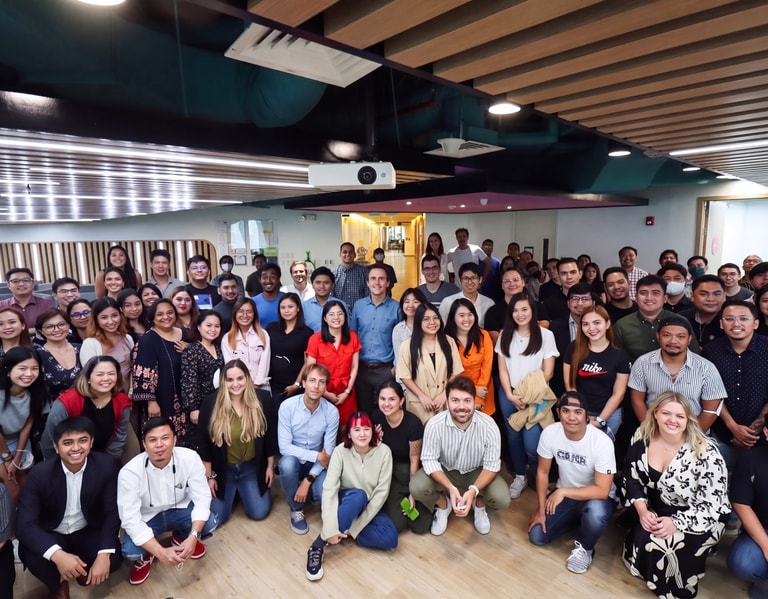 The team gathered in the office during the aggregator years