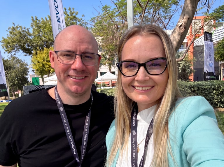 Joel and Ksenia at an industry event in 2022